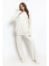 Model wears Beige Lounge set with Zip Detail & Matching Wide Leg Trousers 