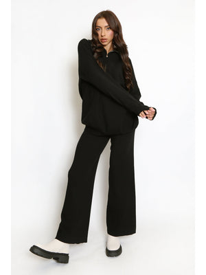 Model wears Black Wide Leg Matching Lounge Set 