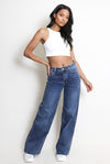 Model Wears High-Waisted Dad Fit Blue Soft Denim Strethcy Jeans