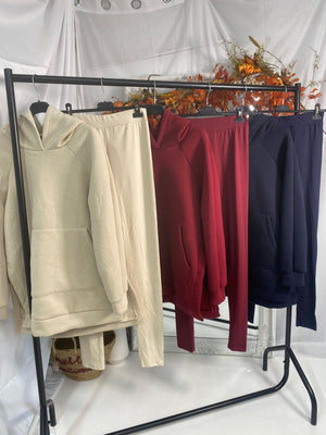 Clothing Rail Holding Hoodie And Matching Lounge Sets In Colours Burgundy ,Navy & Stone 